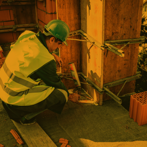 A caulker repairs an existing structure