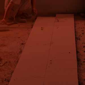 Terrazzo worker laying out a terrazzo floor